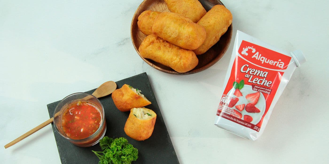 Pastel de arracacha con relleno de ajiaco con crema de leche Alquería