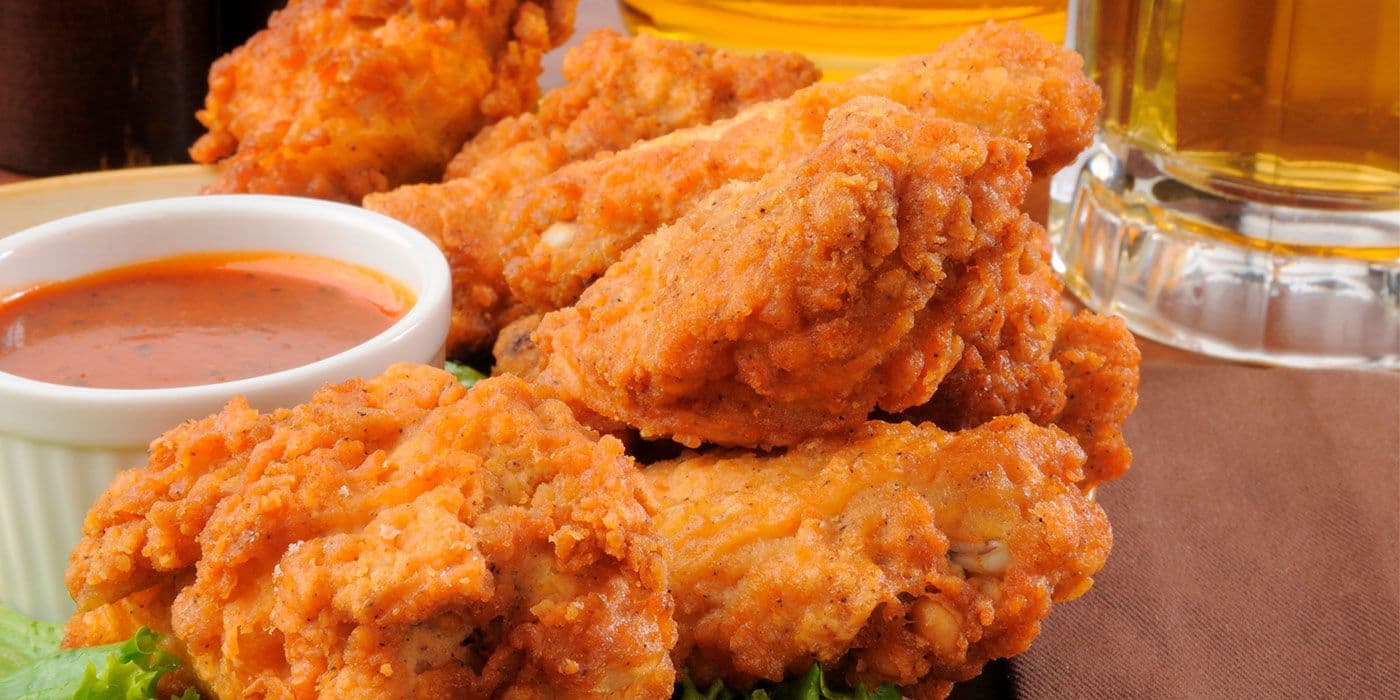 Muslos de pollo apanado en crema agridulce