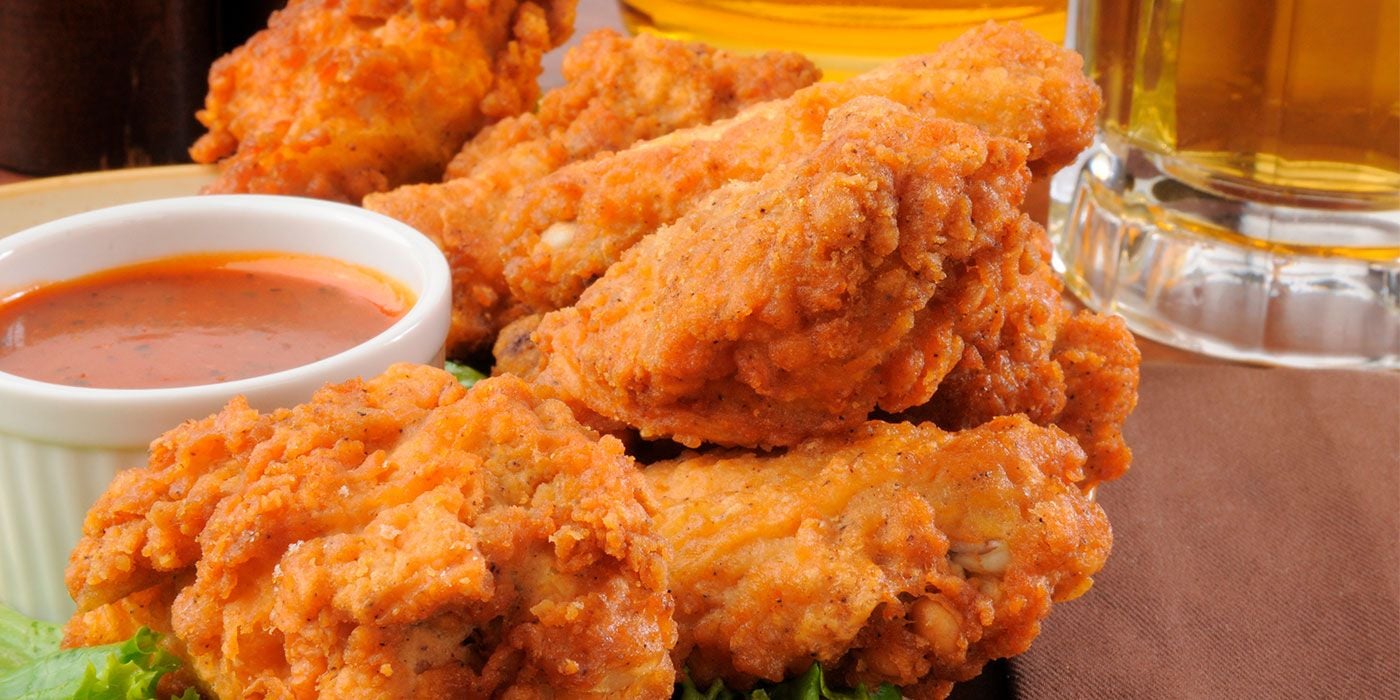 Muslos de pollo apanado en crema agridulce