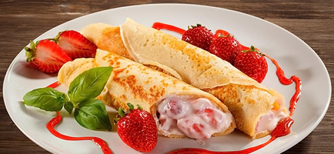 Rollitos cremosos de crepes y fresas